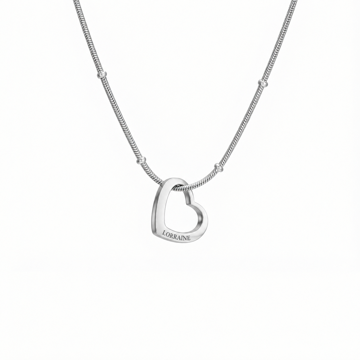 Single engraved silver heart pendant on a bead chain